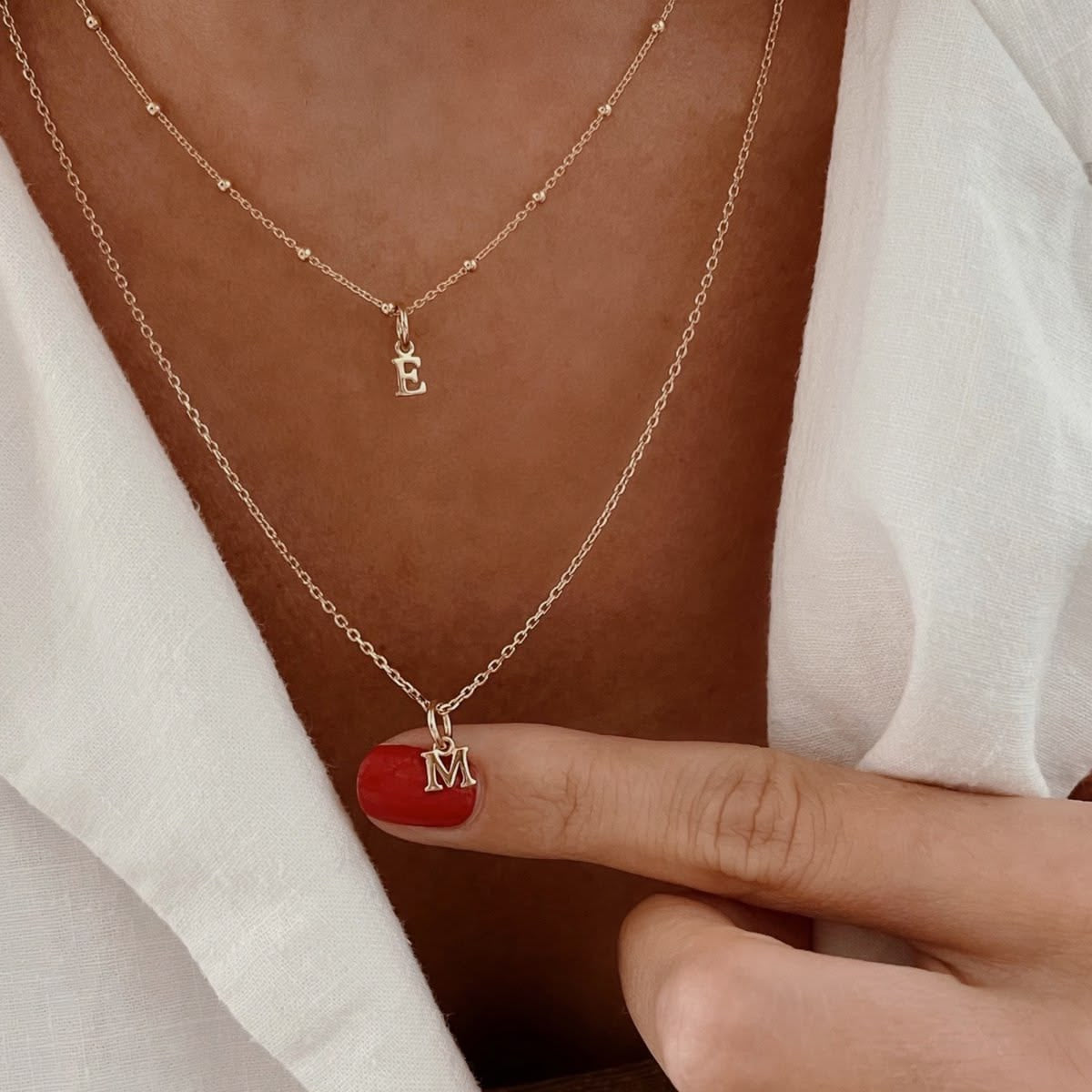 Kişiye özel harf detaylı ikili kolye seti 14k altın kaplama