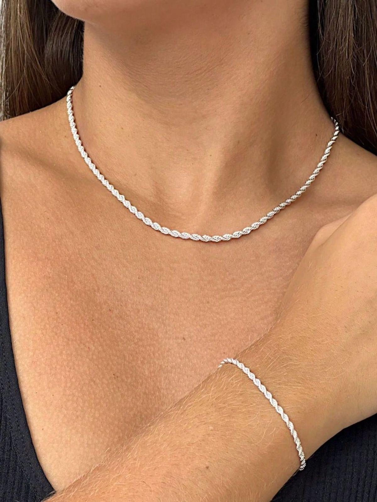 elegantes Armband-Halsketten-Set aus speziell beschichtetem Stahl mit Schnecke